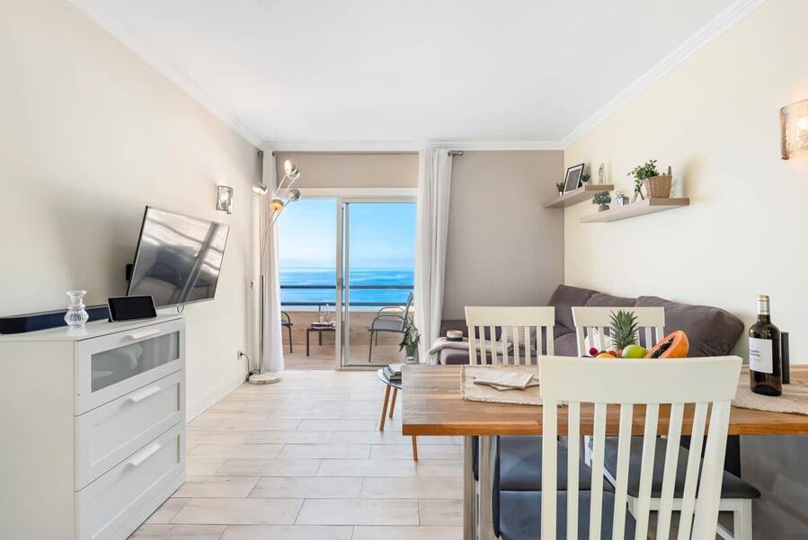 Living Room with Terrace, Sitting & Dining Areas & Multimedia Entertainment