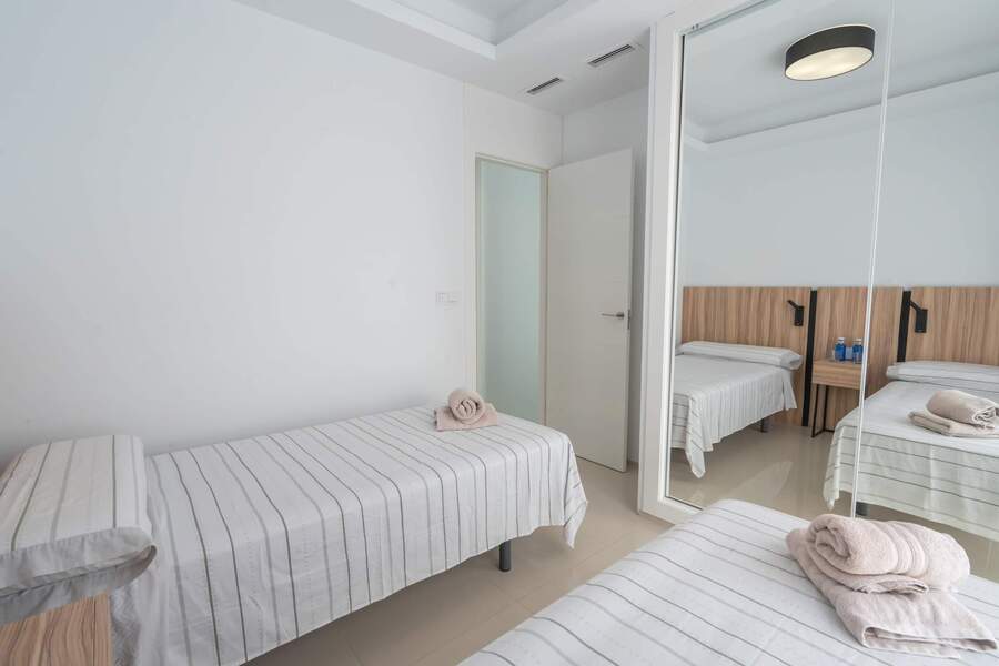3rd Bedroom with 2 Single Beds and Closet