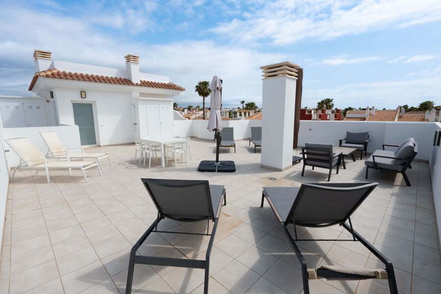 Terrace with Dining Table, Seating Area, Sun Loungers and Sun Umbrella