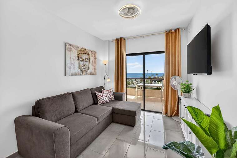 Modern Living Room with Balcony Views