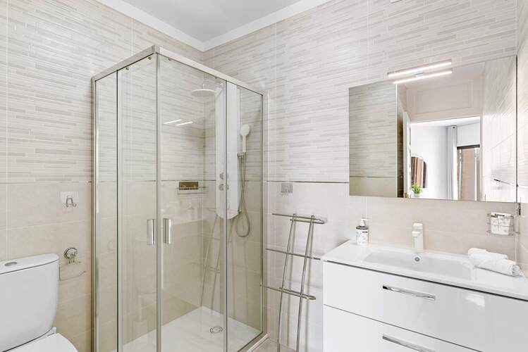 Bathroom with Toilet, Multi-Jet Shower and Sink