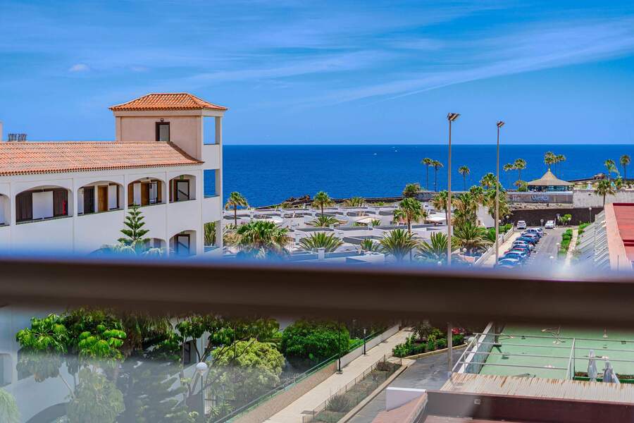 Balcony with Ocean View, Sun Loungers, Dining Table and Chairs