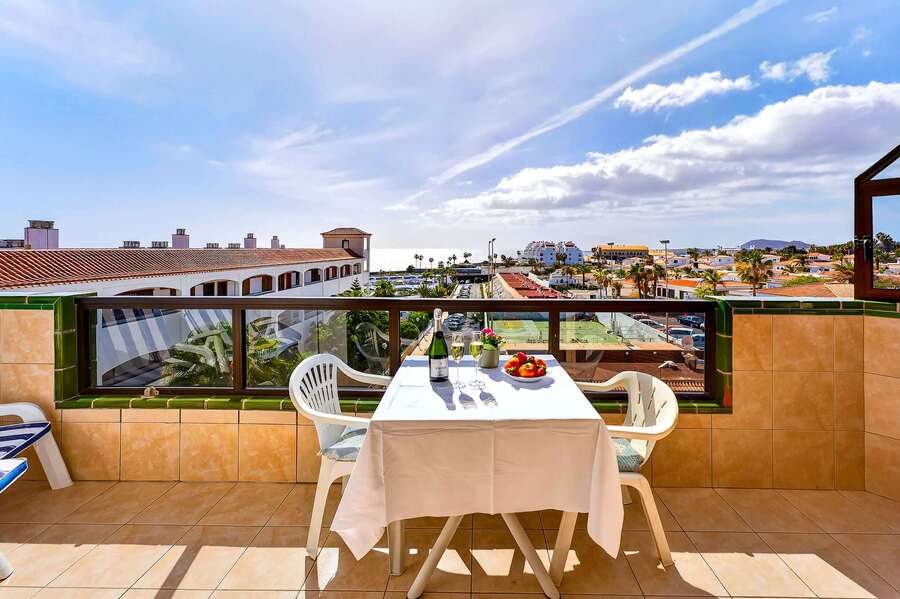 Balcony with Ocean View, Sun Loungers, Dining Table and Chairs