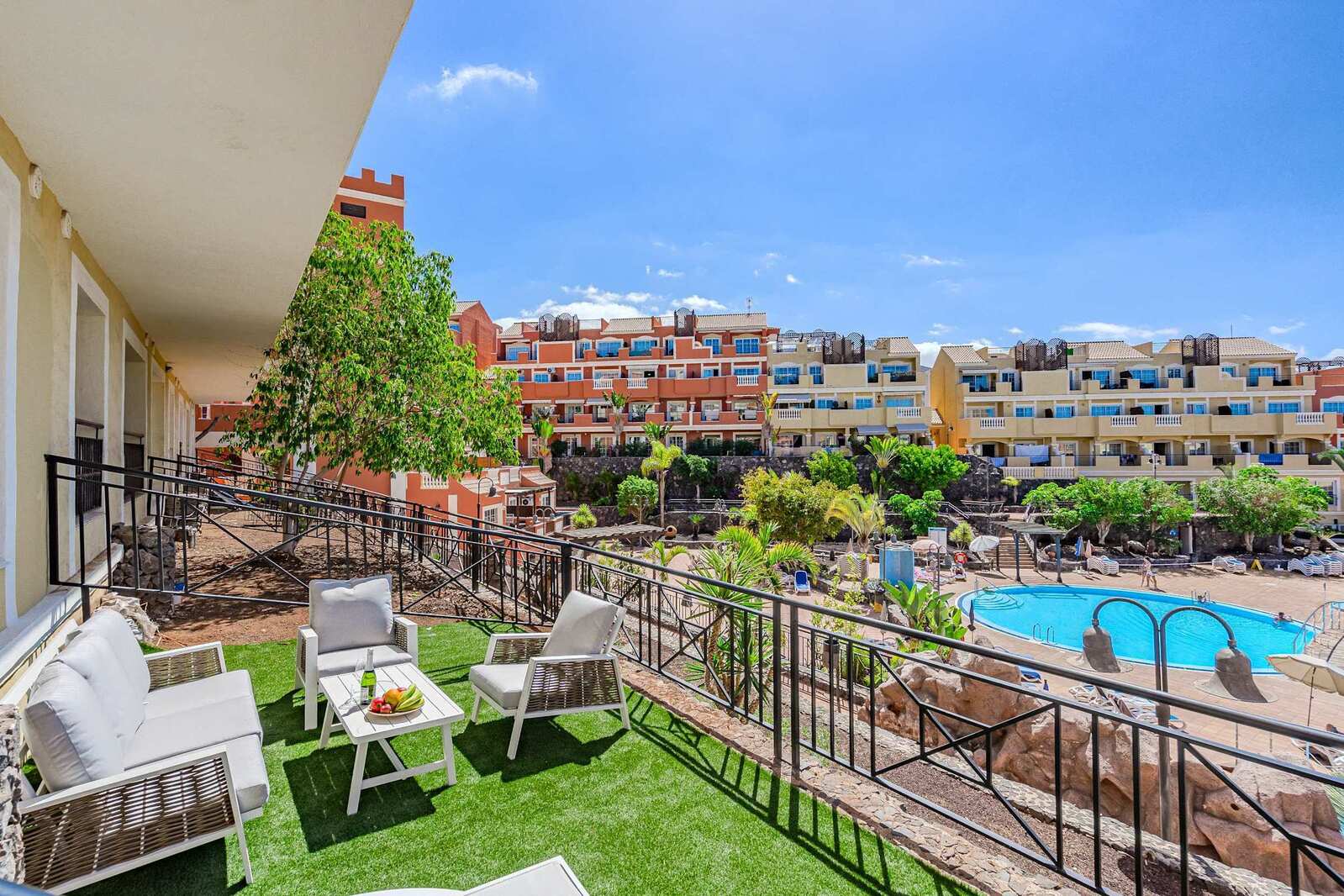 Patio with Outdoor Seating and Dining Area, Sun Lounger and Pool View