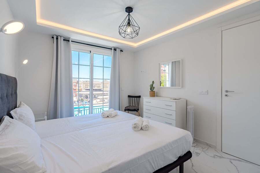 Main Bedroom with Double Bed, Wardrobe, Room Darkening Shades and Pool View
