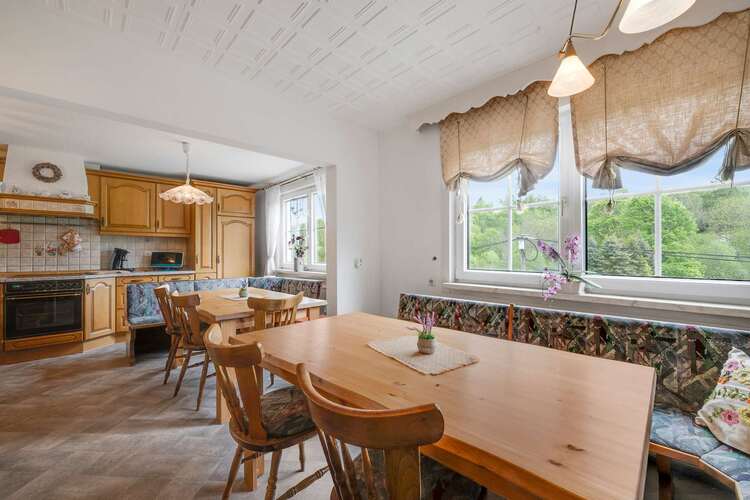 Spacious Kitchen with Dining Area, perfect for Shared Meals and Morning Coffee with a View.