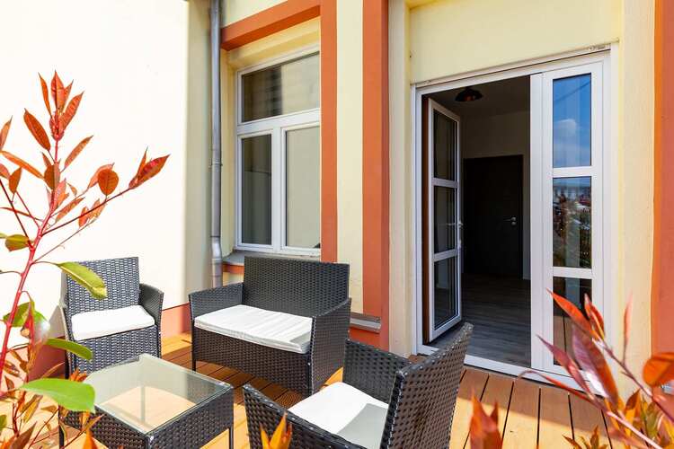 Private terrace with chairs and table