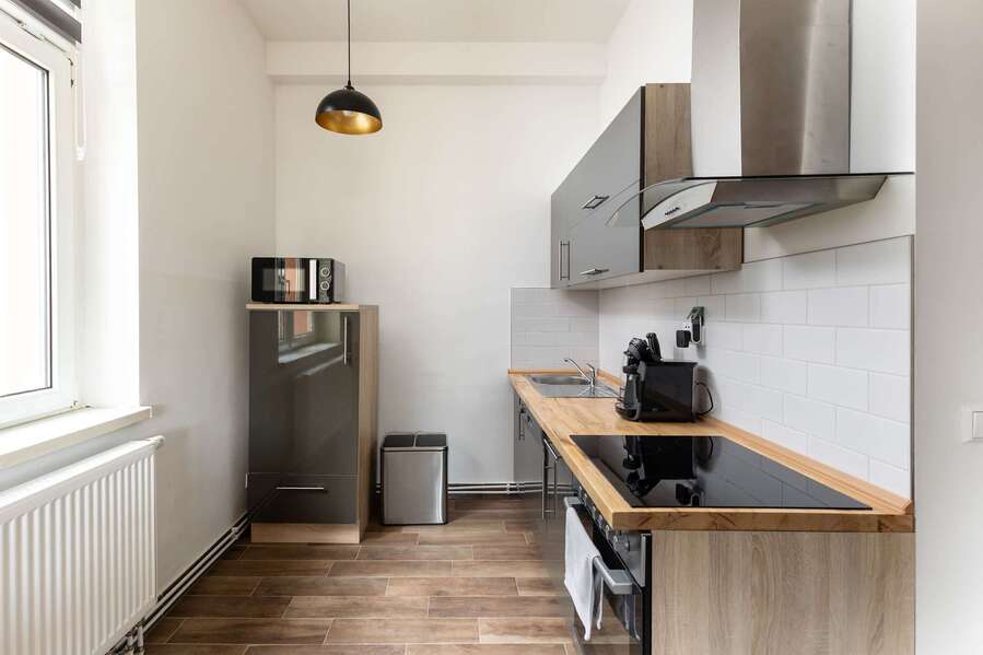 Fully Equipped Kitchen with Fridge, Oven, Microwave & Coffee/Tea Maker