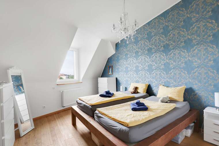 Stylish Bedroom with | King Bed, Natural Light & Chandelier