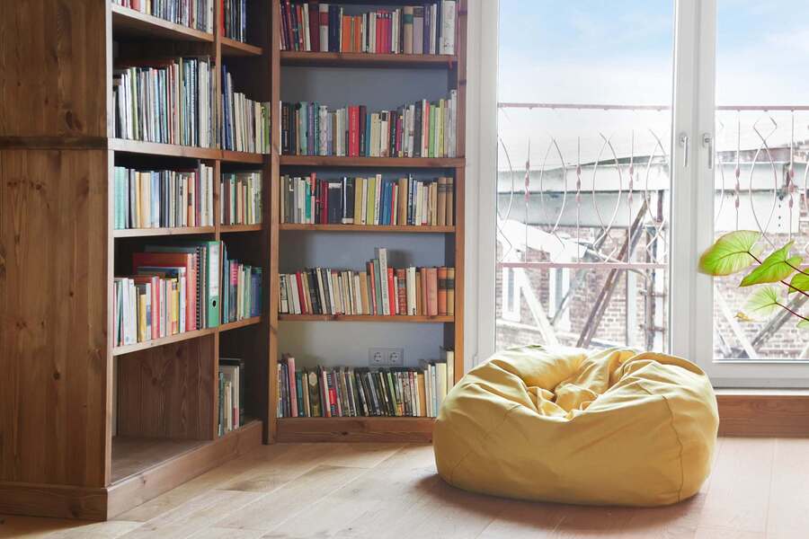 Tranquil Reading Nook | Floor-to-Ceiling Bookshelves & Sunny Beanbag Corner