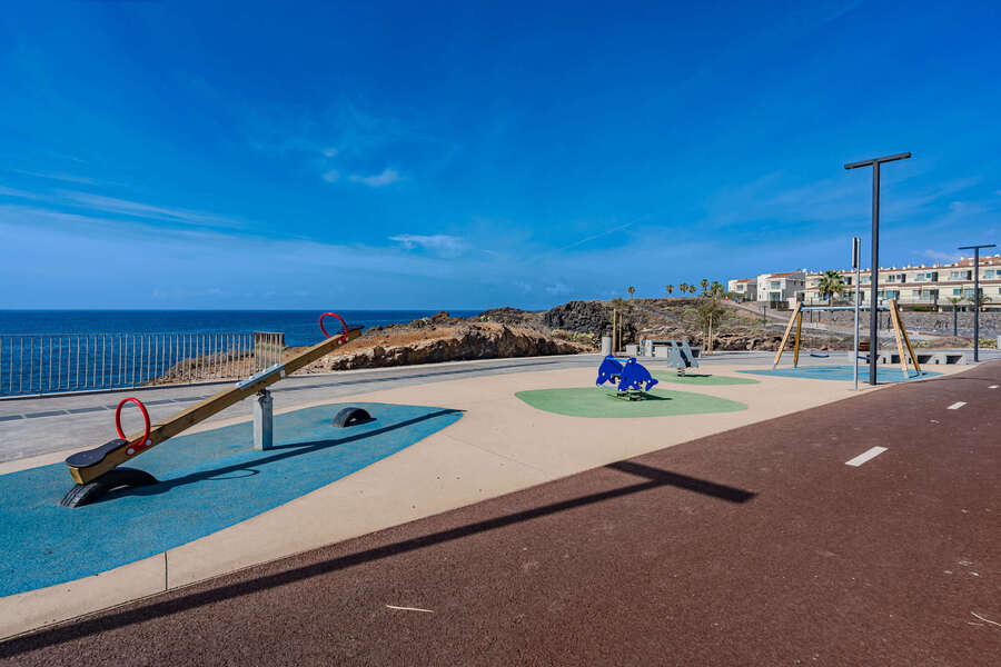Oceanfront Playground with a View — A Sunny Spot Where Little Ones Can Play While You Enjoy the Sparkling Atlantic Backdrop