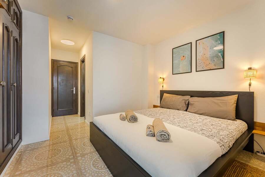 Tranquil Master Bedroom Retreat — Stylish Decor, Soft Lighting, and a Comfortable King Bed for Restful Nights in Paradise