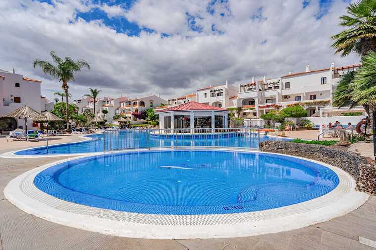 Resort Pool with Swim-Up Bar & Sun Loungers — A Dreamy Place to Soak, Sip, and Enjoy the Canary Island Sun