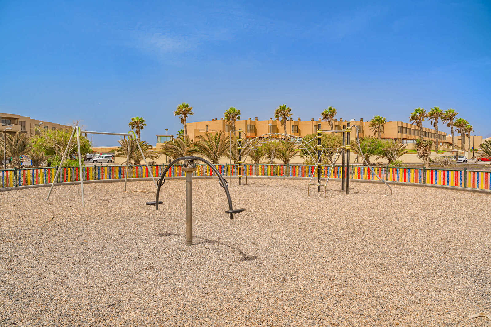 Family Playtime by the Sea – Colourful Playground Moments in the Sun