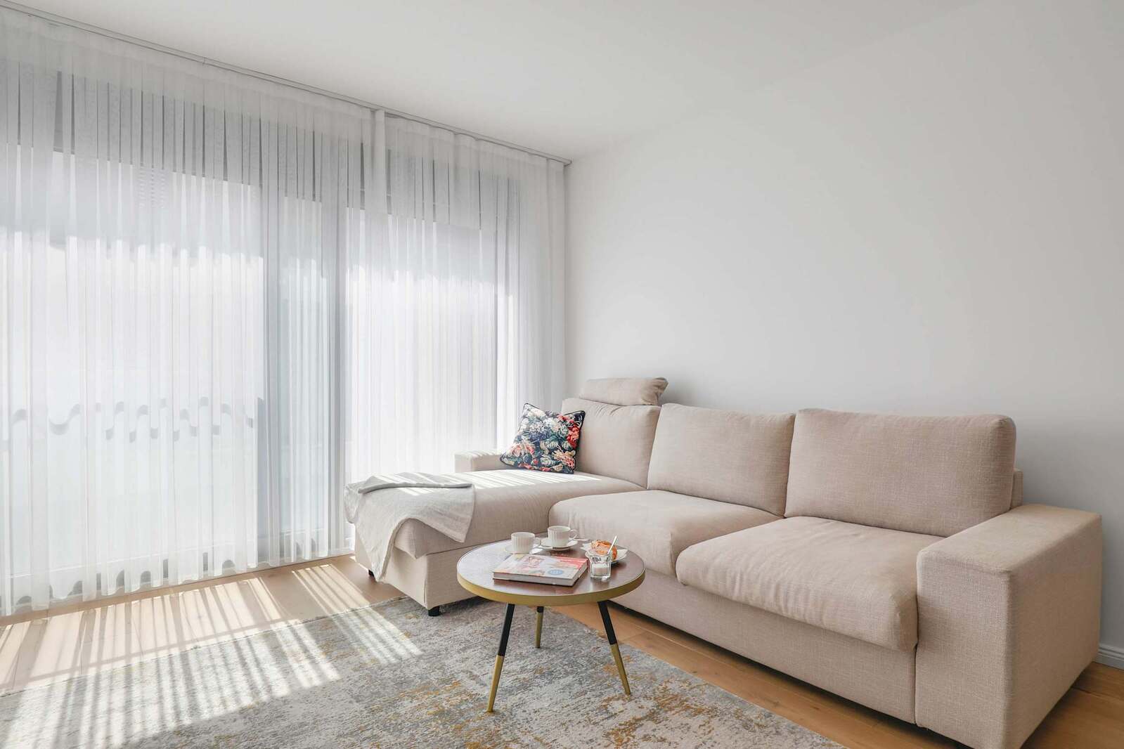 Sunlit Corner Sofa for Unwinding or Streaming — Lounge in Soft Light with Your Favourite Book or Series