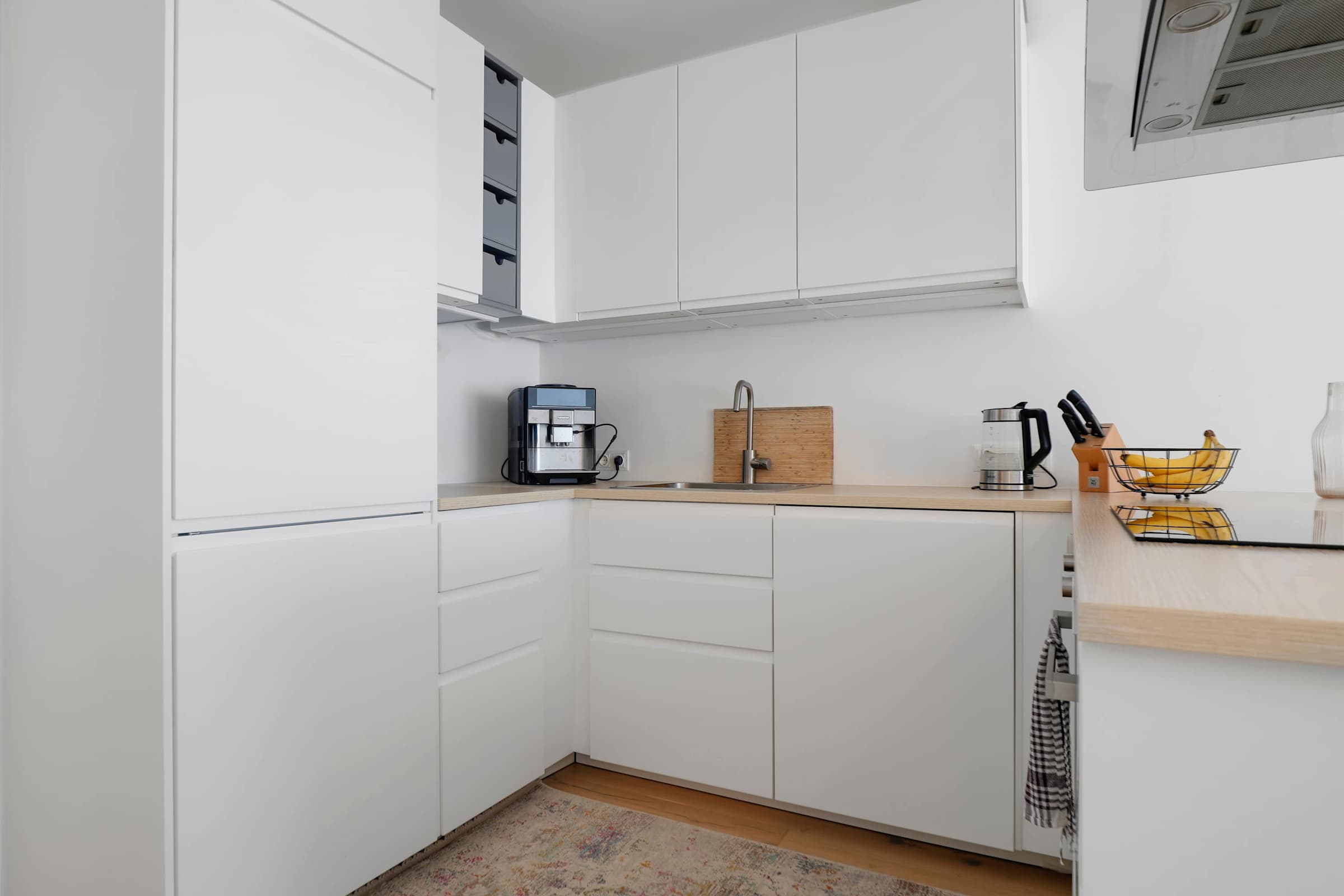 Modern Kitchen with Coffee Station, Premium Appliances, and Soft Lighting