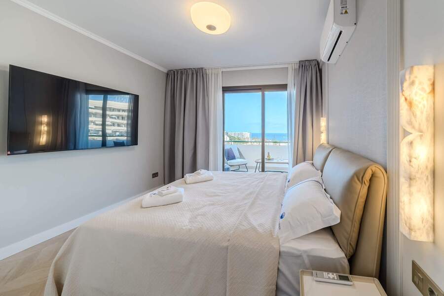 Wake Up to Sea Views – Elegant Bedroom with Direct Terrace Access for Serene Mornings