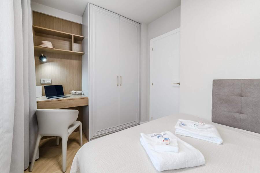 Bright Bedroom with Desk – A Peaceful Retreat for Work & Relaxation