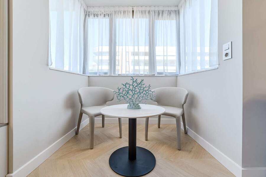 Chic Corner Sitting Spot – A Quiet Space to Unwind with a Book or Morning Coffee