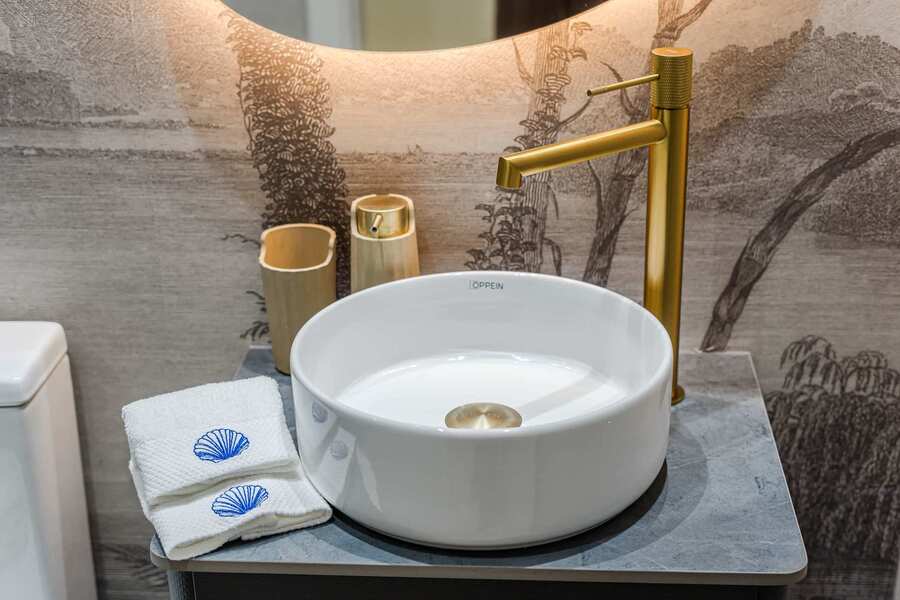 
Designer Vessel Sink Vignette – Elevate Your Routine with a Statement Basin and Luxurious Textured Wallpaper Backdrop