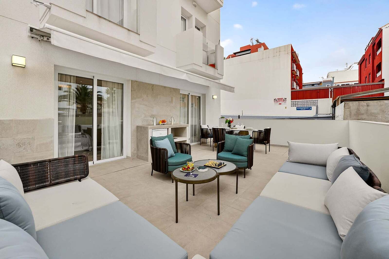 Designer Outdoor Lounge with Dining & Daybeds — Entertain in Style on Your Private Sun-Drenched Terrace in Playa San Juan