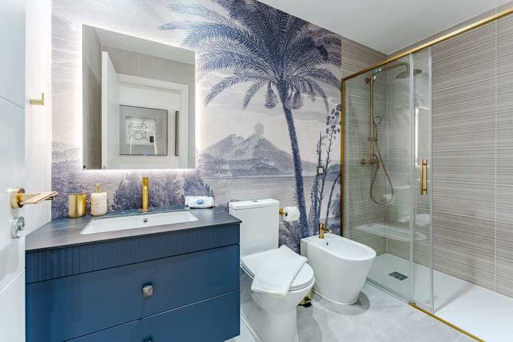 Chic Spa-Inspired Bathroom – Refresh in Style with Gold Fixtures, Tropical Mural, and Rainfall Walk-In Shower