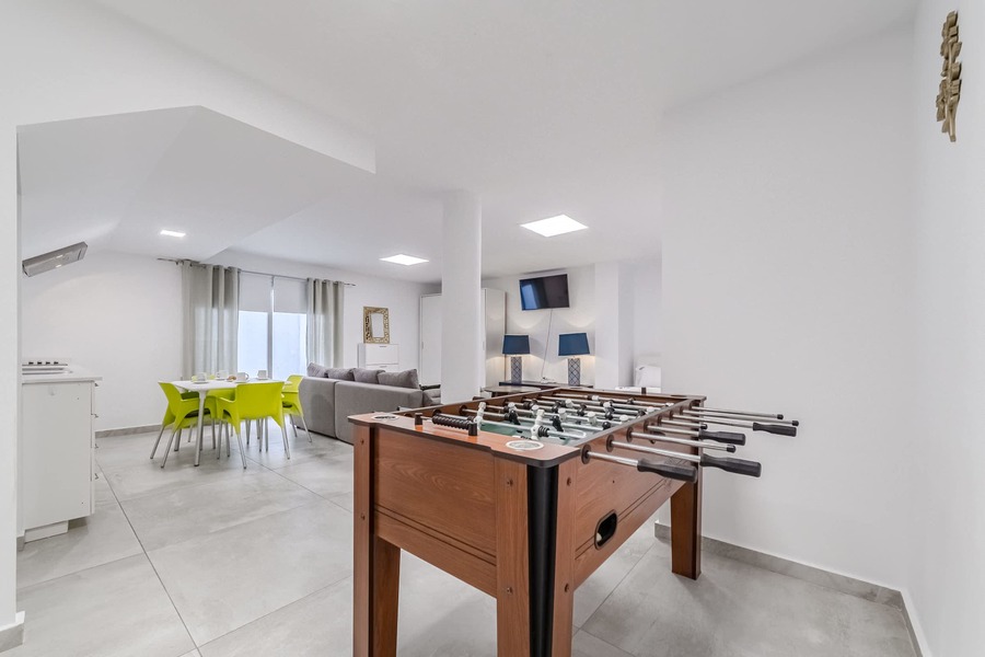 Open-Concept Lounge with Foosball & Kitchen  