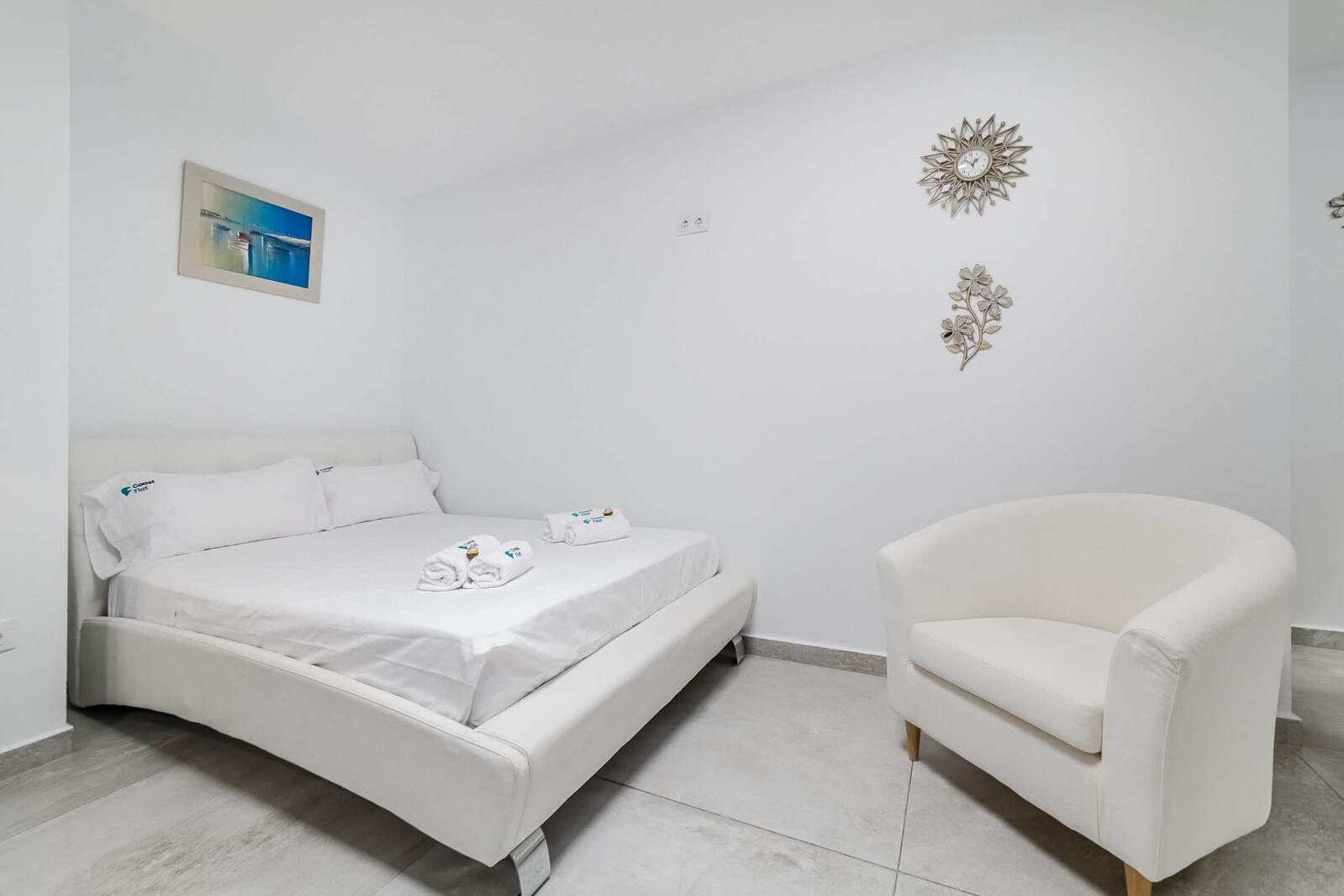 Peaceful Bedroom with Crisp White Decor - Comfort Meets Simplicity for a Restful Night