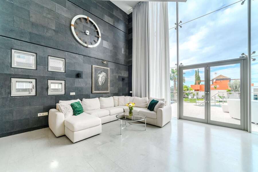 Designer Living Space with Oversized Clock Feature - Where Luxury Meets Comfort in Costa Adeje
