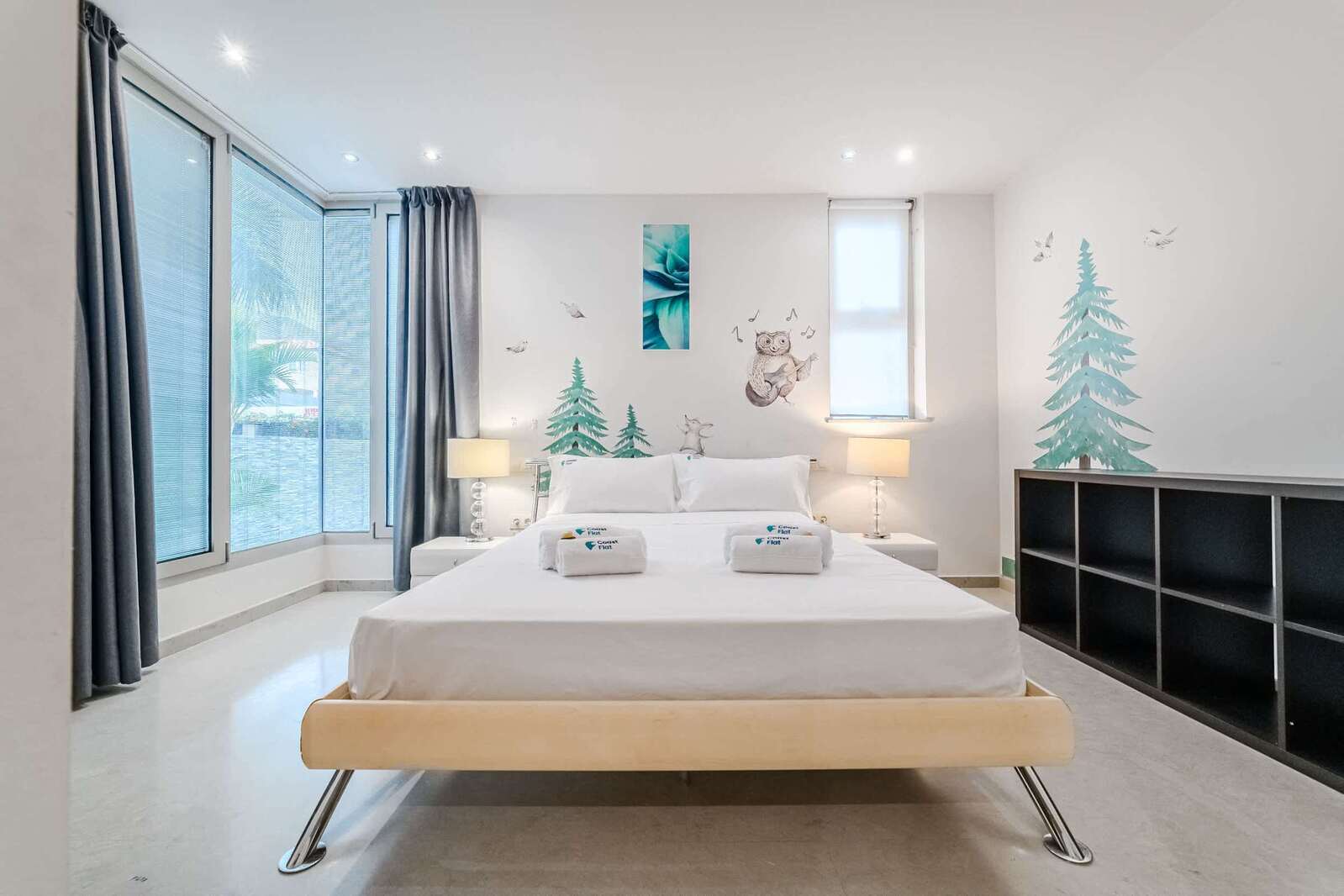 Forest-Themed Bedroom with Floor-to-Ceiling Windows - Playful Elegance for All Ages