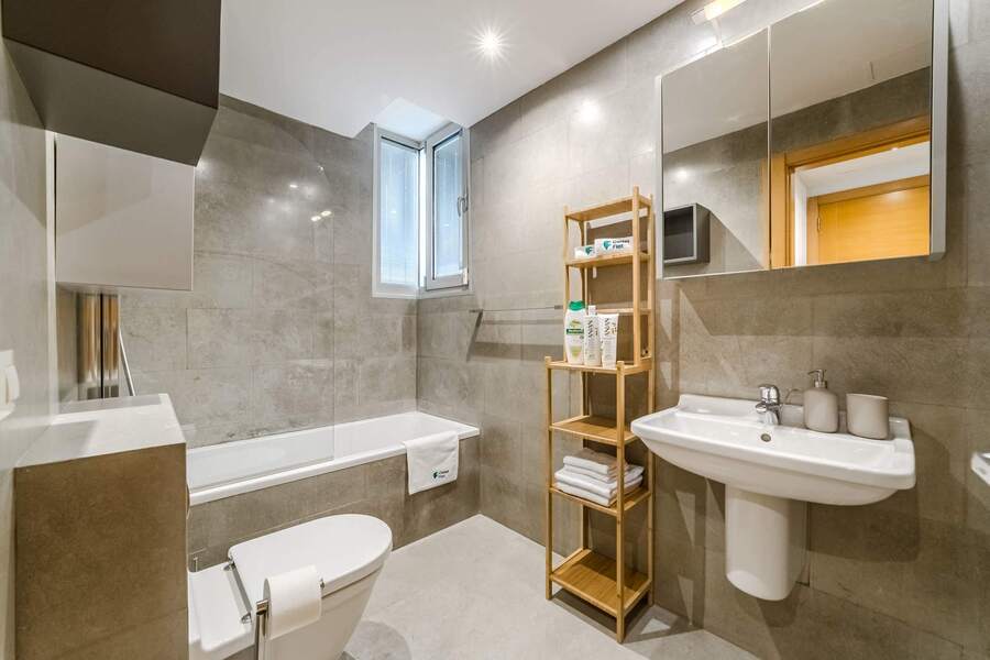Bright Bathroom with Bathtub - Fresh and Functional for Your Daily Routine
