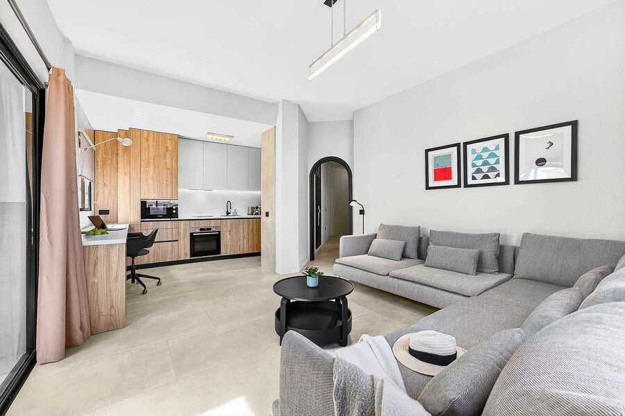 Sitting & Sleeping in a Spacious Living Area with Ocean View, AC, Multimedia TV & Sonos Sound System, Dedicated Working Space & Direct Exit to the Private Roof-Top Terrace