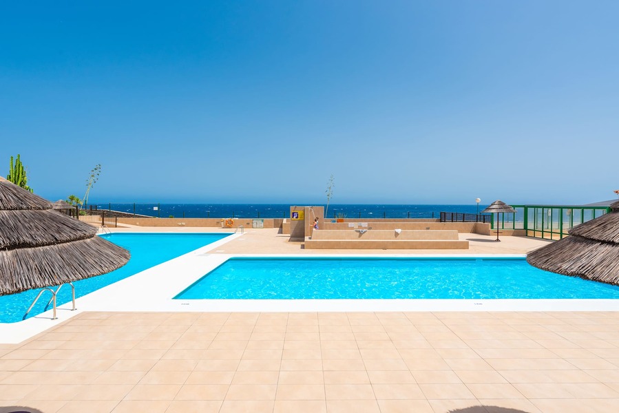 Year-Round Pool Area with Ocean Views