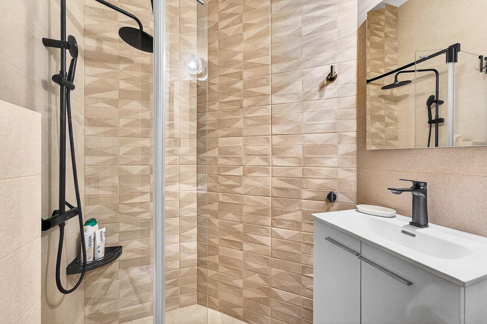 Second Bathroom with Shower, WC, Sink, and all Amenities