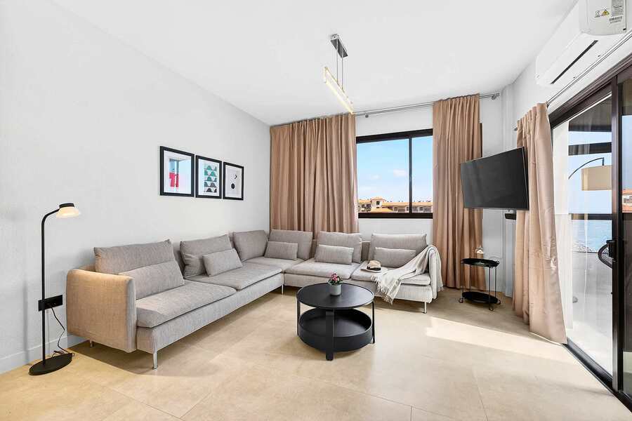 Sitting & Sleeping in a Spacious Living Area with Ocean View, AC, Multimedia TV & Sonos Sound System, Dedicated Working Space & Direct Exit to the Private Roof-Top Terrace