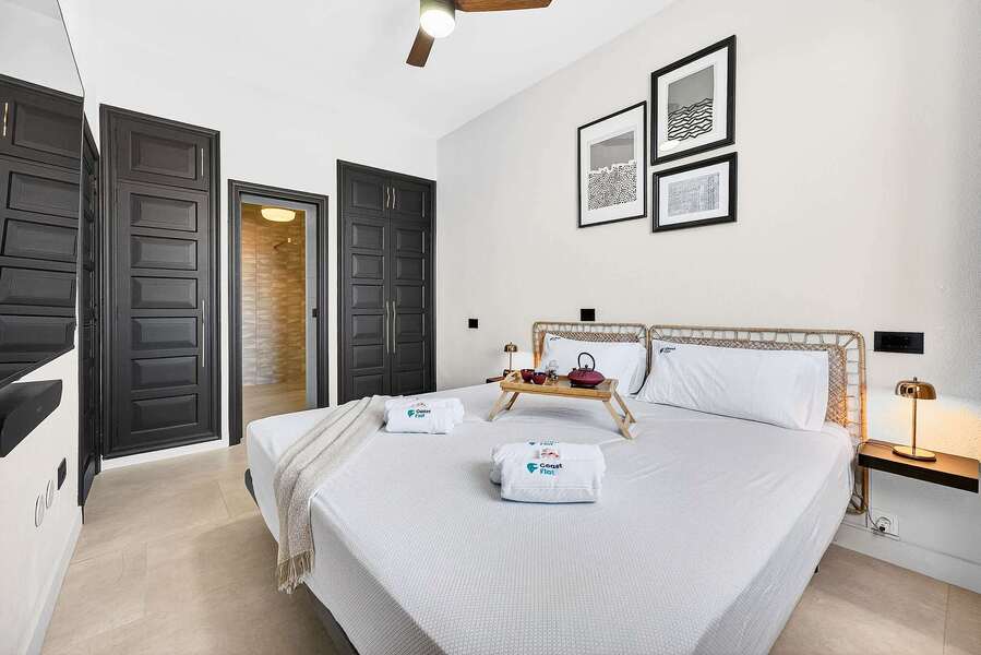 Master Bedroom with a King-Size Bed, Ocean Views, Wardrobes, En-Suite Bathroom and Multimedia TV & Sonos Sound System