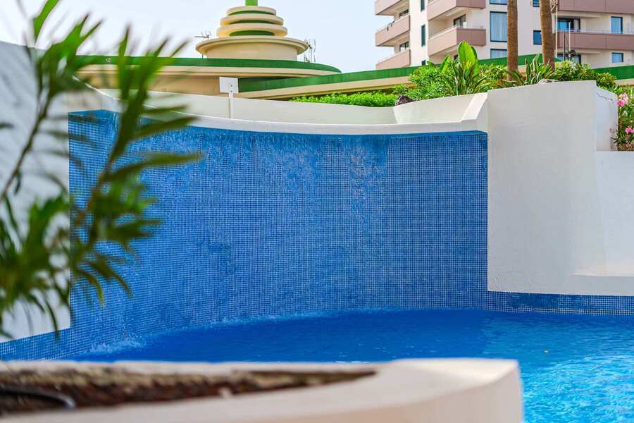 Resort-Style Swimming Pool with Sun Loungers