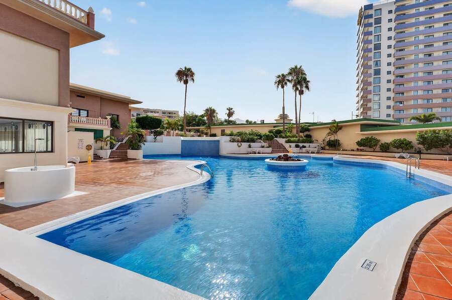Resort-Style Swimming Pool with Sun Loungers