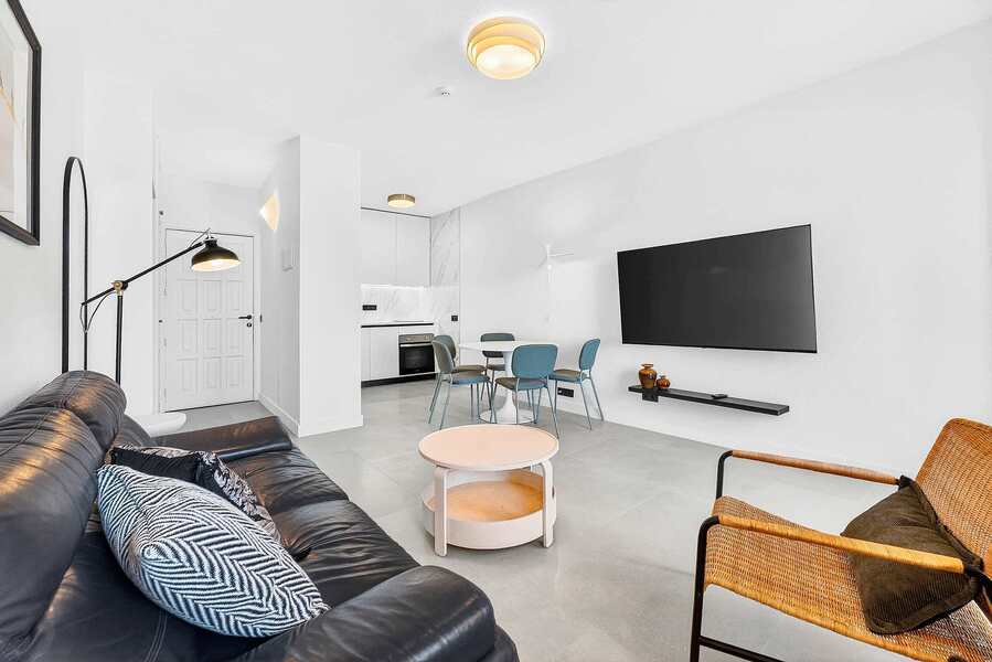 Spacious Open-Plan Living Area with Fully Equipped Kitchen & Dining Space