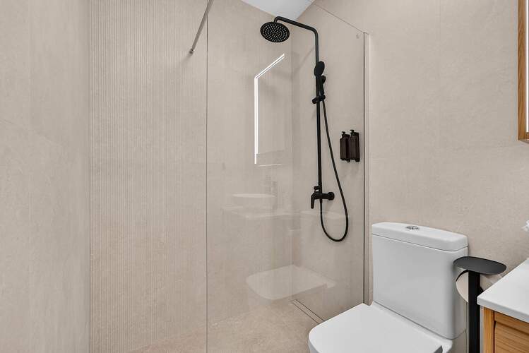 Spa-Inspired Bathroom with Elegant Walk-In Rain Shower