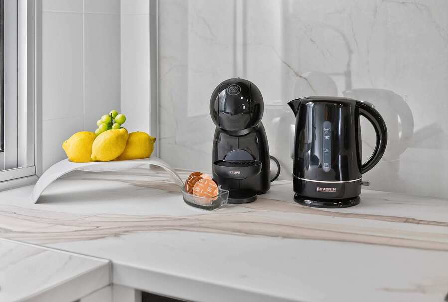 Fully Equipped Kitchen with Coffee Machine and Kettle 