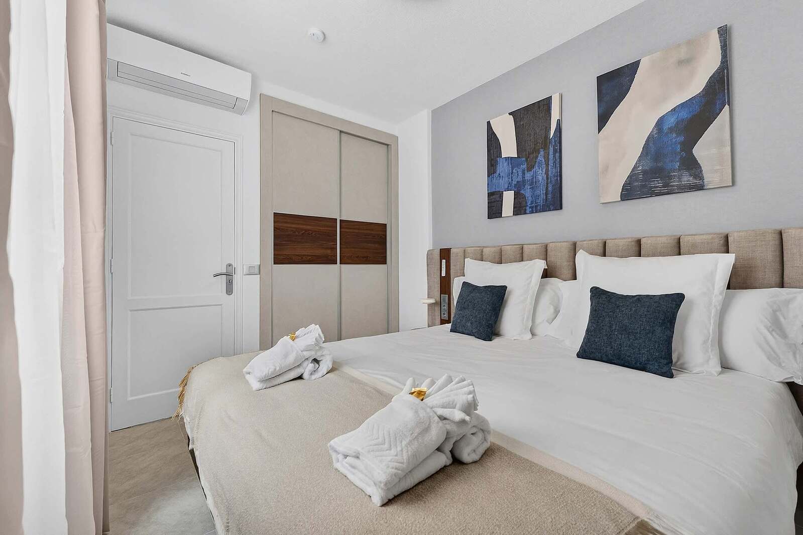
Serene Boutique Bedroom with Sophisticated Island-Inspired Interiors