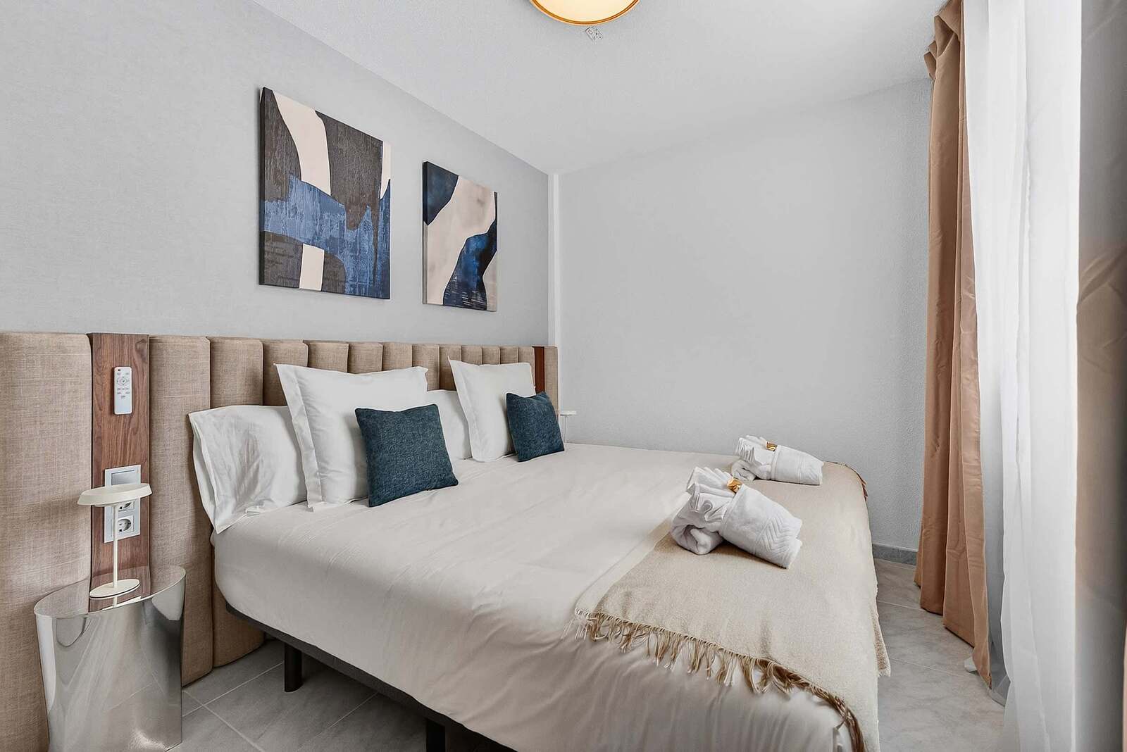 
Serene Boutique Bedroom with Sophisticated Island-Inspired Interiors