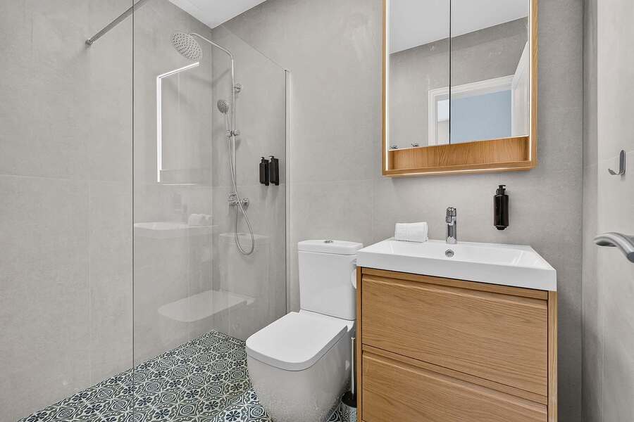 Spa-Inspired Bathroom with Elegant Walk-In Rain Shower