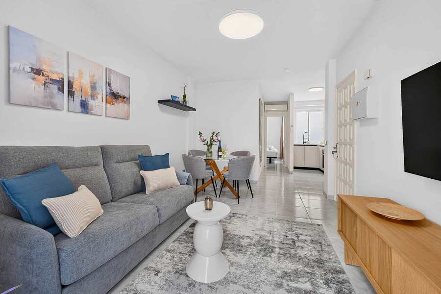 Bright Living and Dining Area with Refined Mediterranean Styling