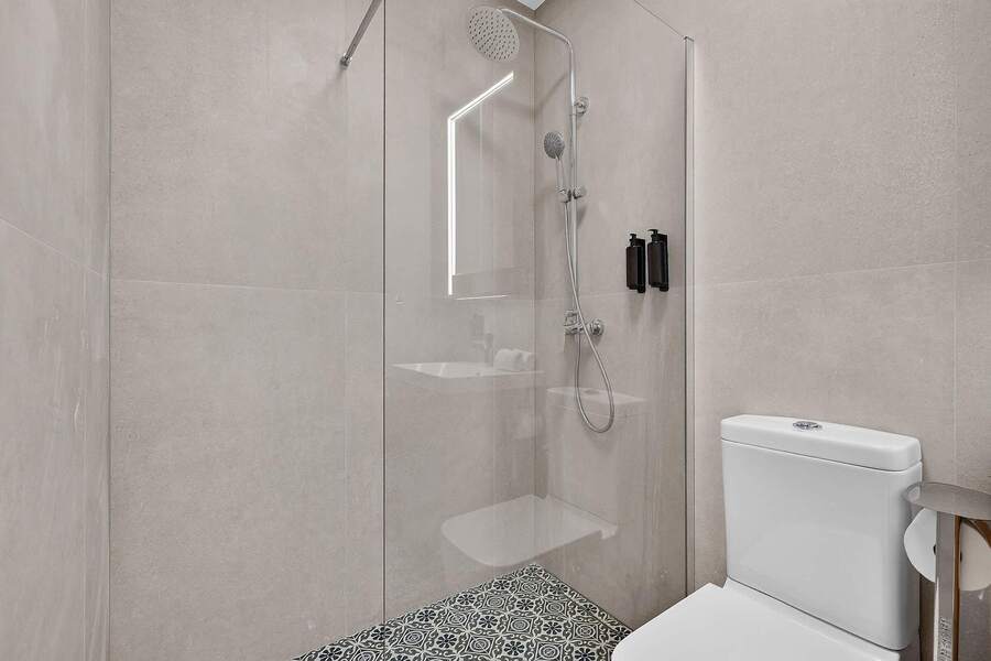 Spa-Inspired Bathroom with Elegant Walk-In Rain Shower