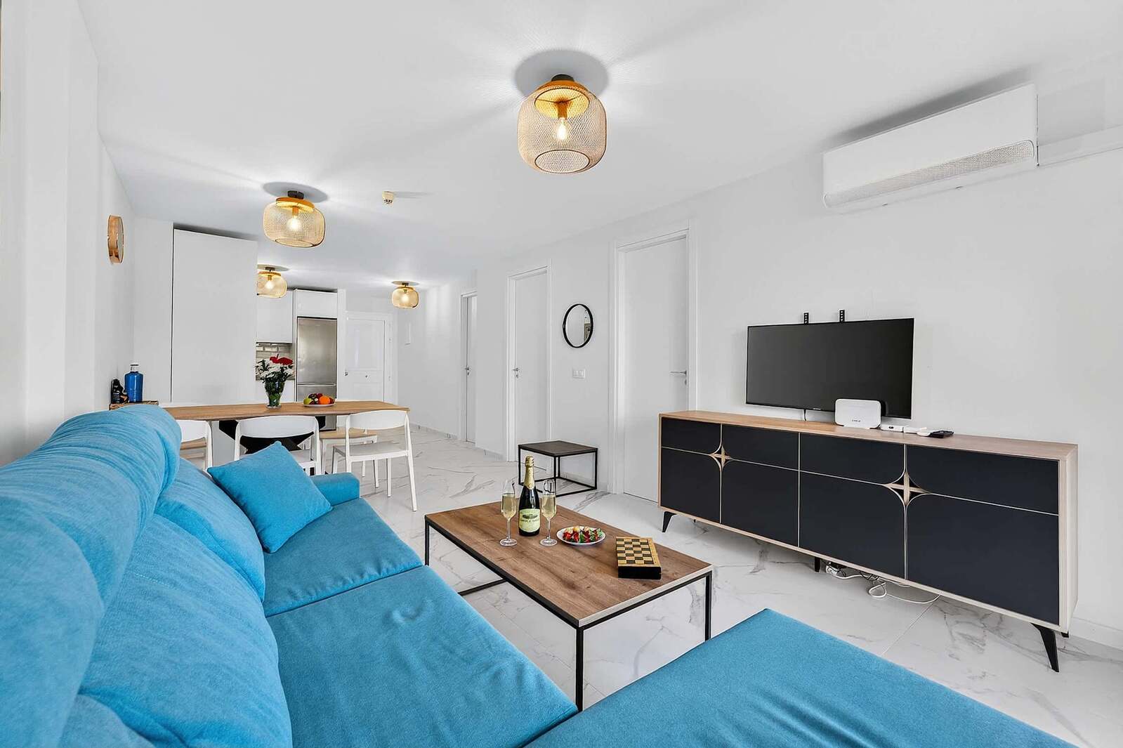 Bright Lounge Area with Smart TV and Direct Terrace Access