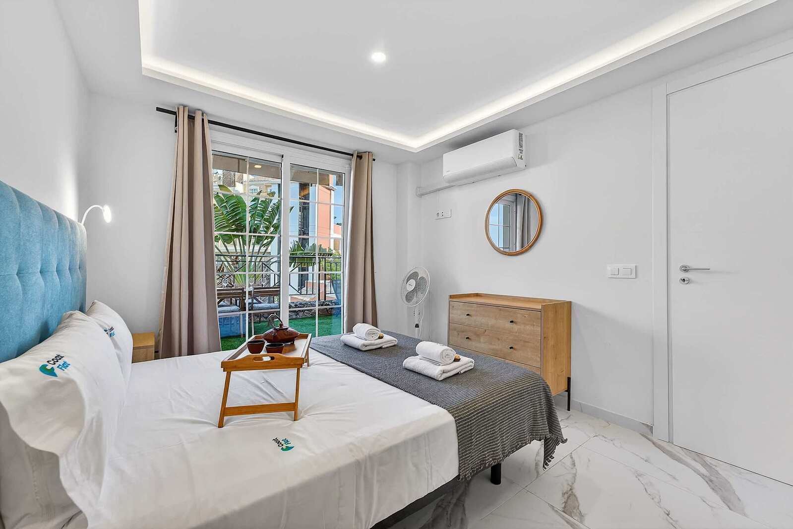 Bright Master Bedroom with Terrace Access and Air Conditioning