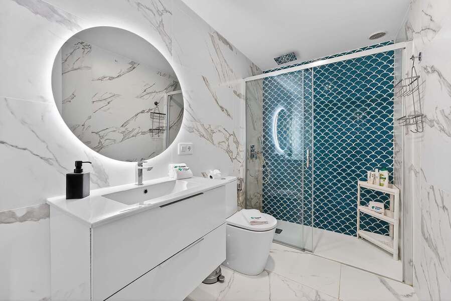 Contemporary Bathroom with Walk-In Shower and Designer Tile Feature