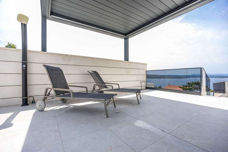 Sun loungers on the pool terrace
